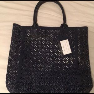 Tory Burch laser cut tote handbag